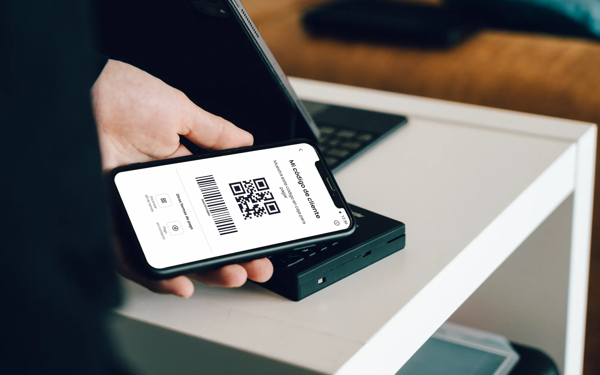 Barcode and QR shown at a store counter